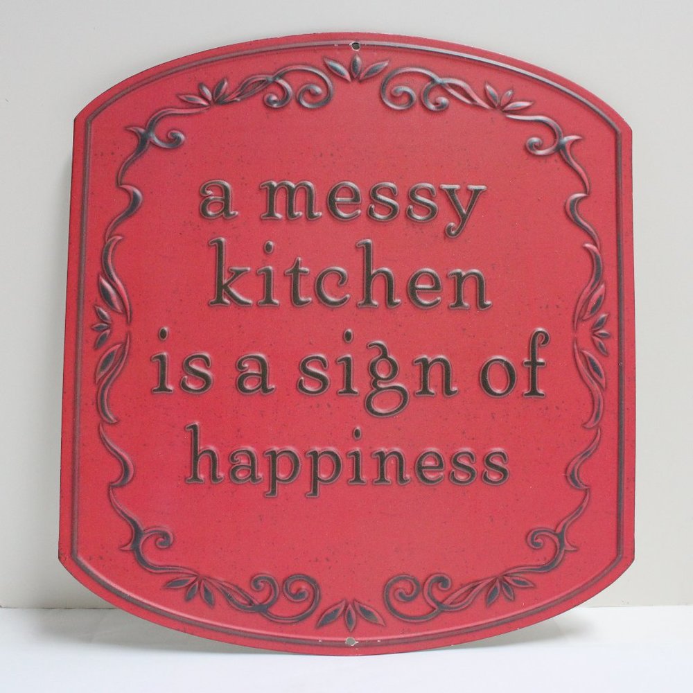 a messy kitchen is a sign of happiness Metal Wall Decor Sign in Red & Black